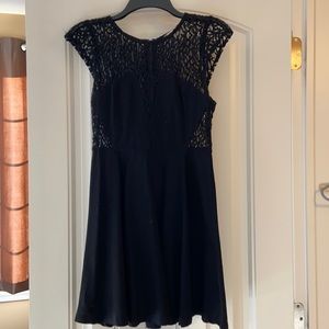 Little black dress with lace top and v cut